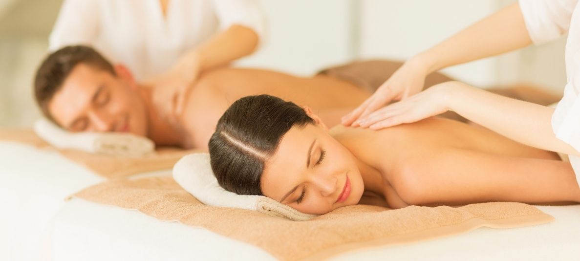 couple getting massage together at spa